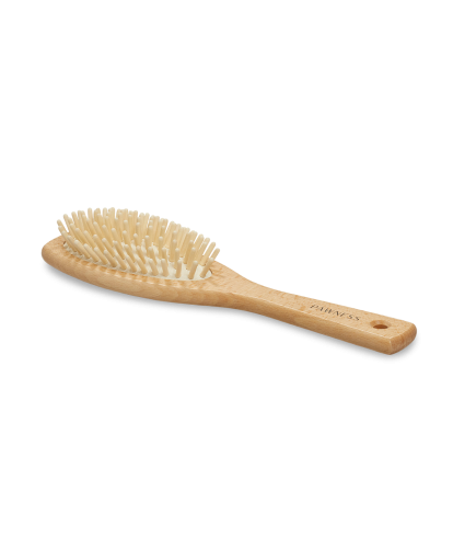 Wooden hair brush with white handle, perfect for daily grooming routine.